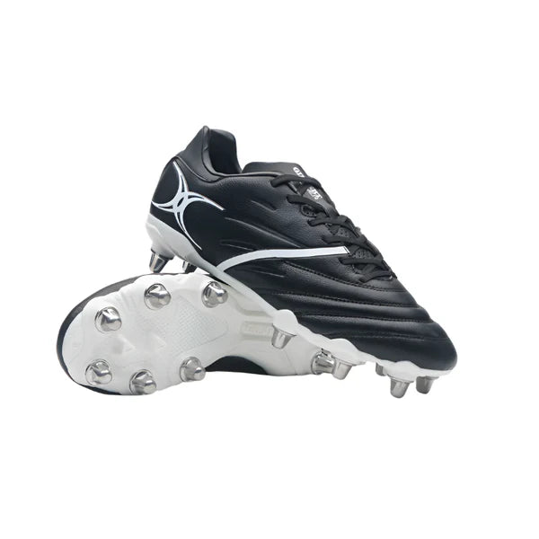 Black and white rugby boots  with metal studs on a white background